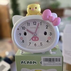 White and Pink Alarm Clock